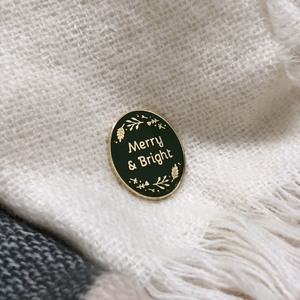 Set Of 'Merry' And 'Wonderful' Enamel Pin Badges