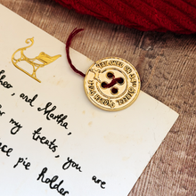 The 34th Street Golden Santa Button
